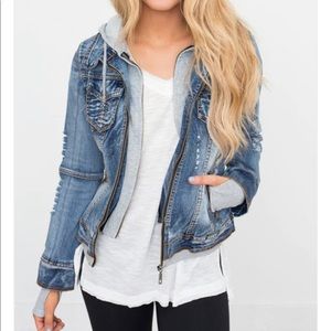 Distressed jean jacket with hoodie insert